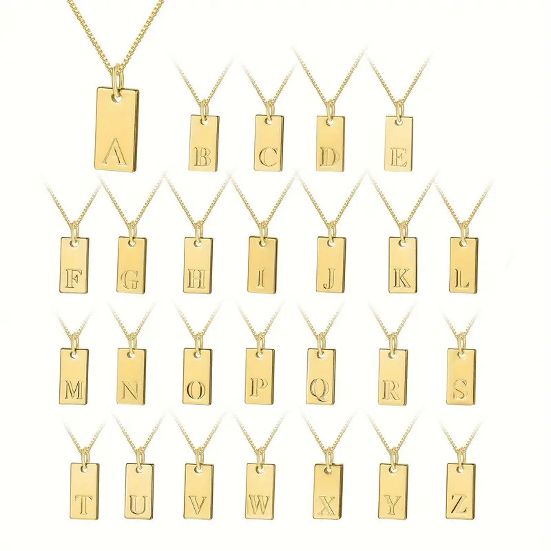 Tiny Square 26 Beginletters Ta - Initial Letter Necklace 18K Gold recensie en prijs